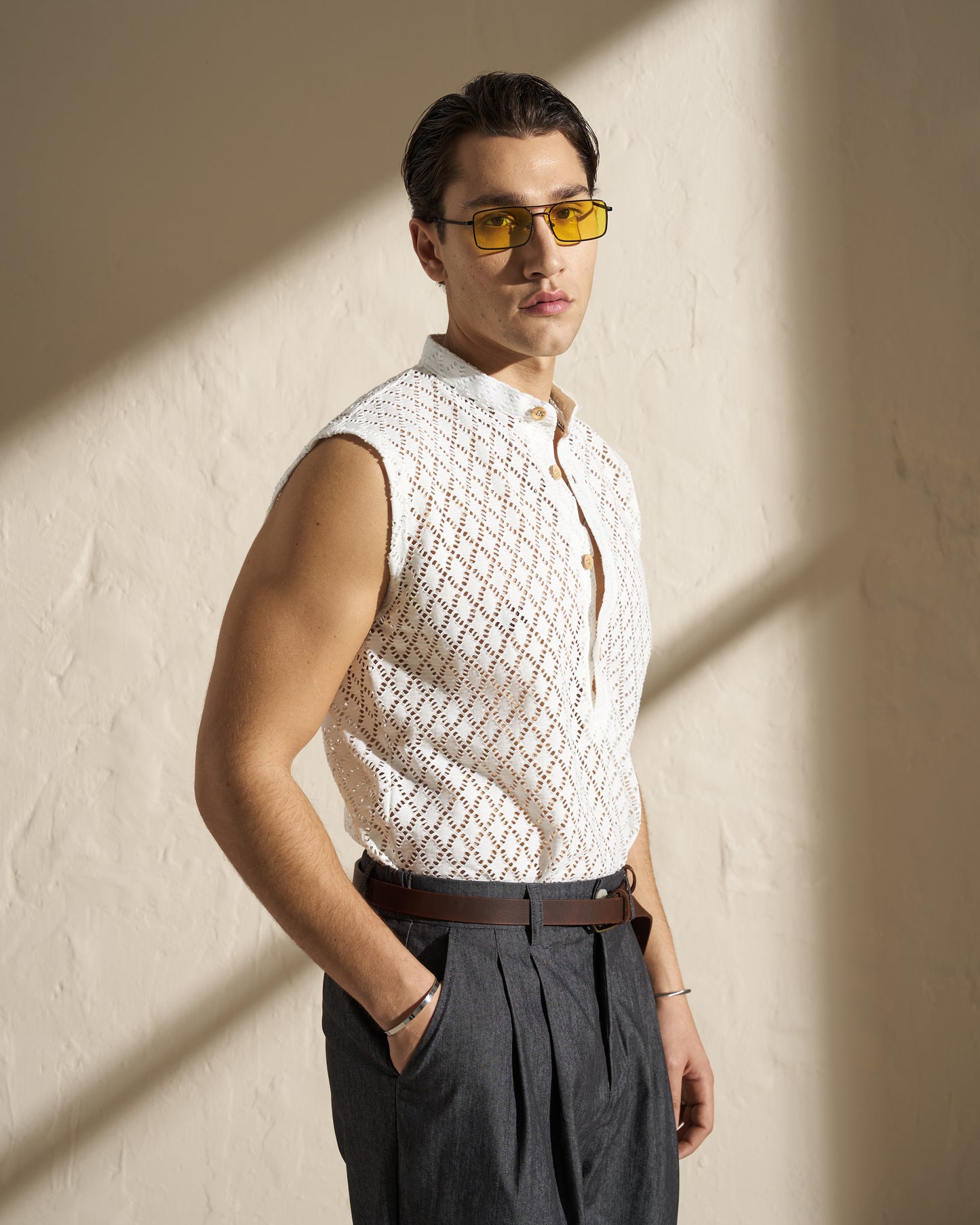 SLEEVELESS TEXTURED KNIT SHIRT